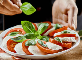 Arranging Caprese on a plate