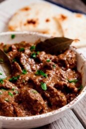 Rogan Josh in a bowl with naan bread