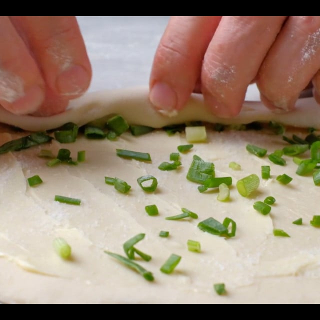 scallion pancake dough with butter and scallions.