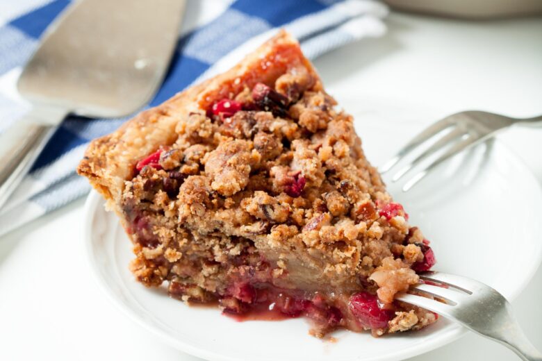 Dutch Apple Pie on a white plate with forks