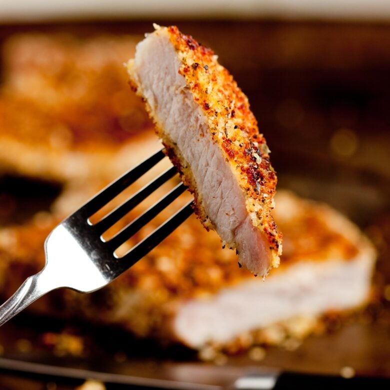 a piece of panko breaded pork chop on a fork