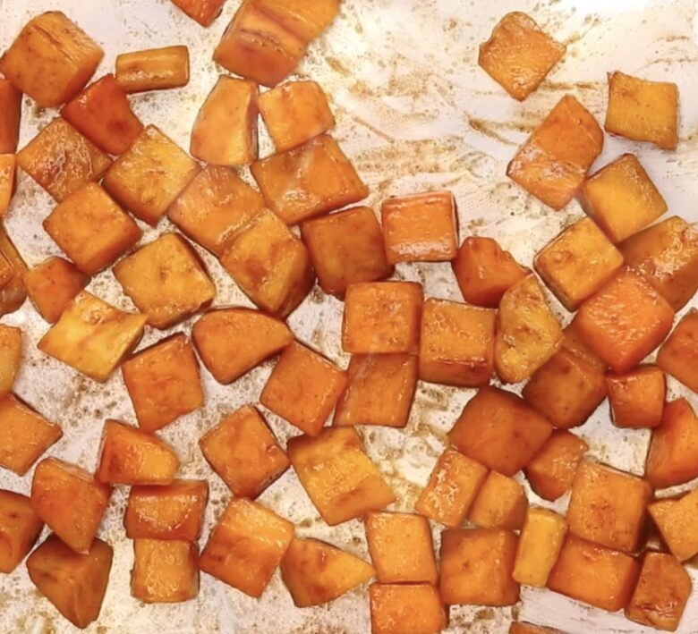 butternut squash on foil lined baking sheet.