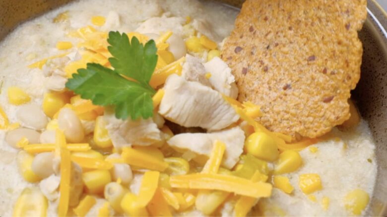 white chicken chili being served with bread