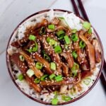 Slow Cooker Teriyaki Chicken over rice in a bowl