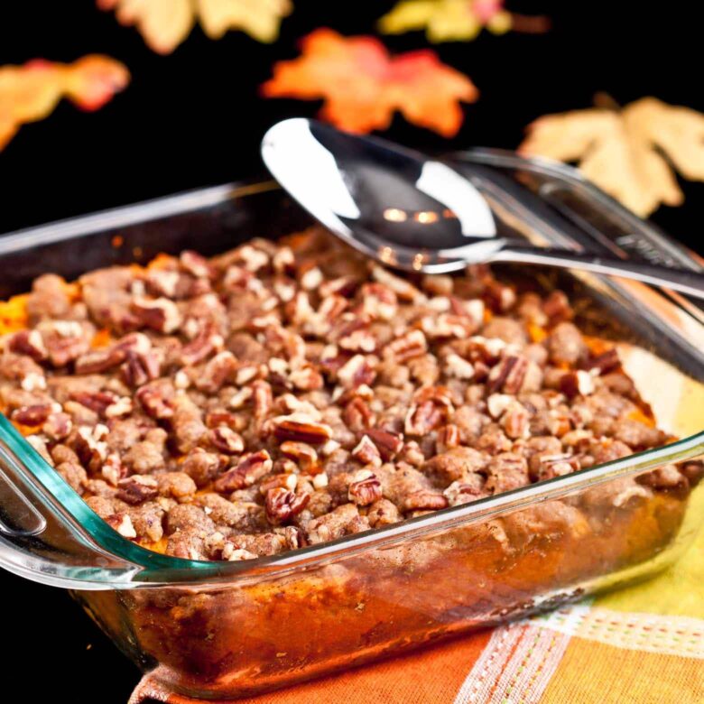 Sweet Potato Casserole In clear dish square.