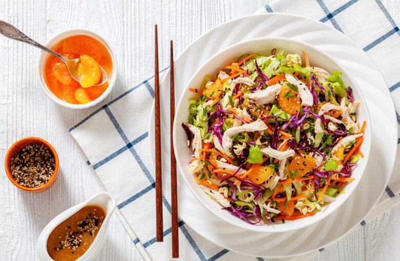 Chinese chicken salad on a white plate 