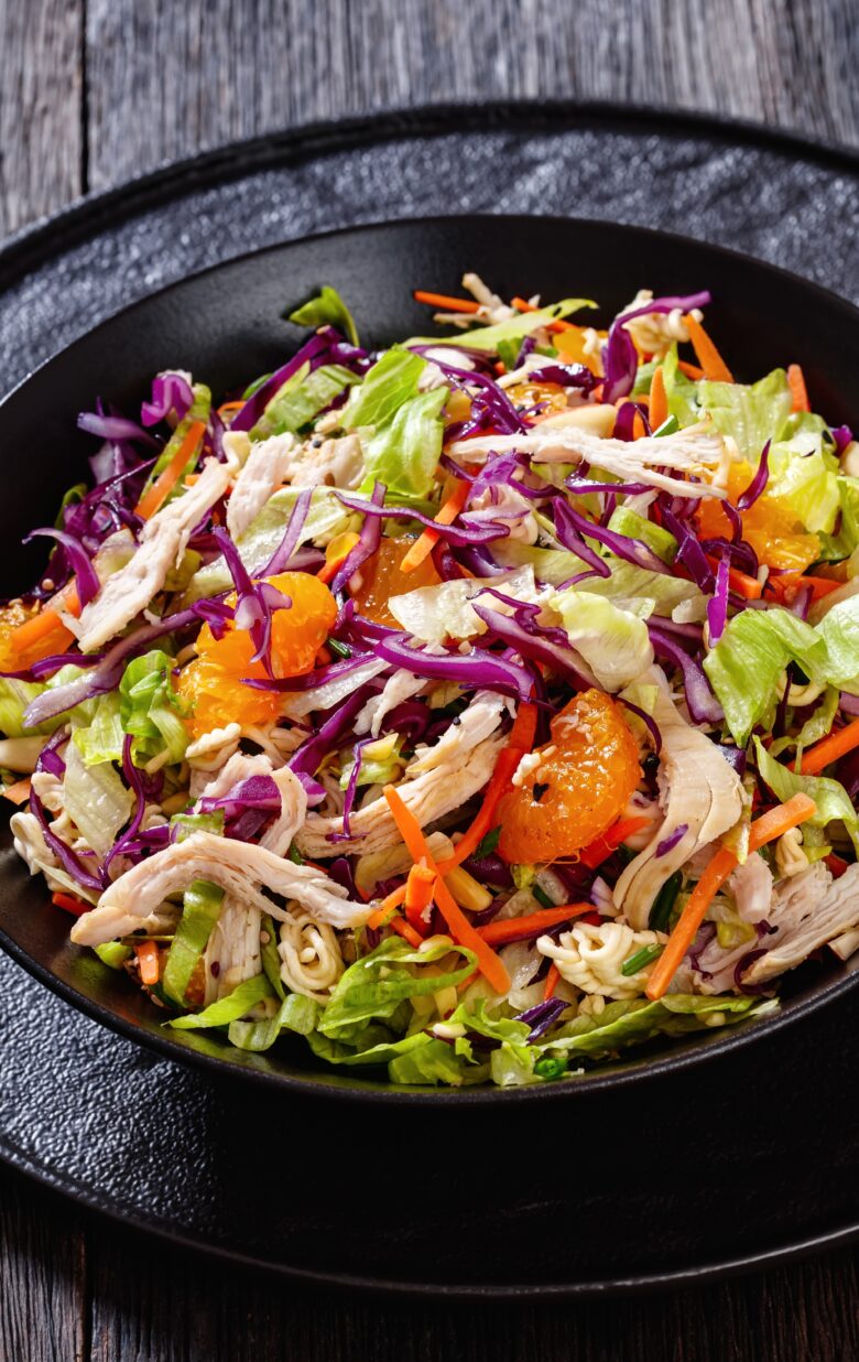 Chinese Chicken Salad on a black plate