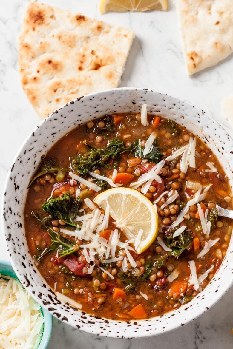 Lentil Soup in Bowl with Pita Bread and Cheese