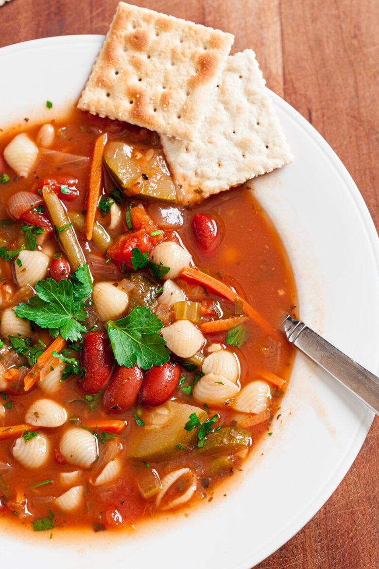 Minestrone soup in a white bowl