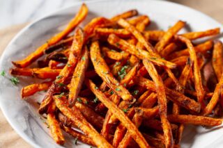 a basket of sweet potato fries