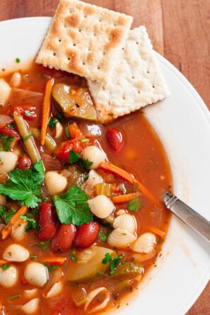 Minestrone soup in a white bowl