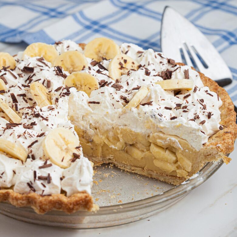 banana cream pie with a slice missing