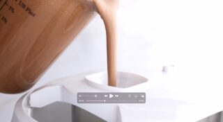 Chocolate Ice Cream Poured into Maker