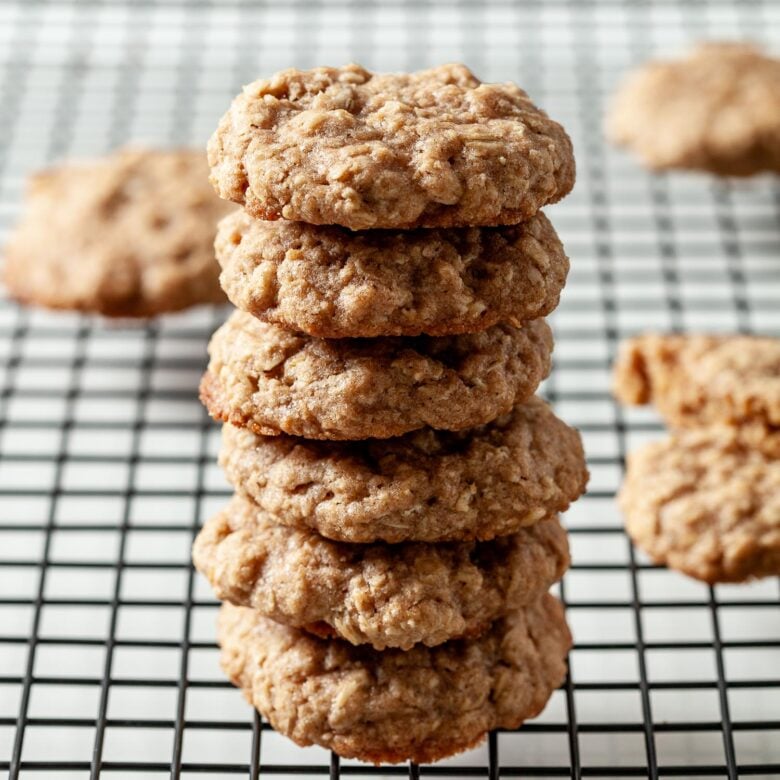 a stack of oatmeal cookies on a wire rack
