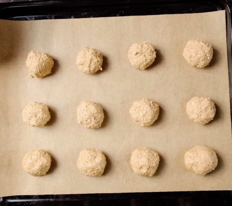 Oatmeal cookies on baking sheet.