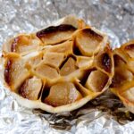 half a head of roasted garlic on aluminum foil