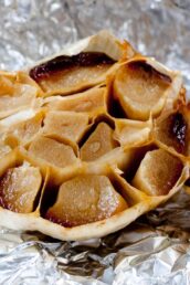 half a head of roasted garlic on aluminum foil