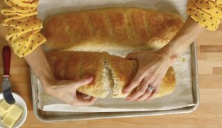 French bread snapping perfectly down the middle