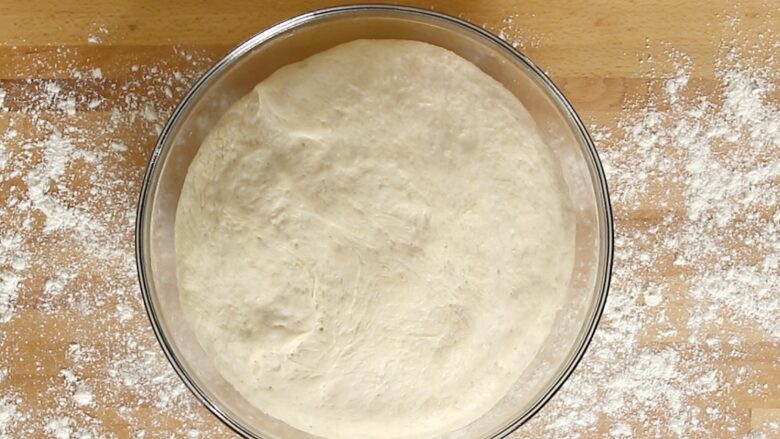 French Bread dough rising in a bowl