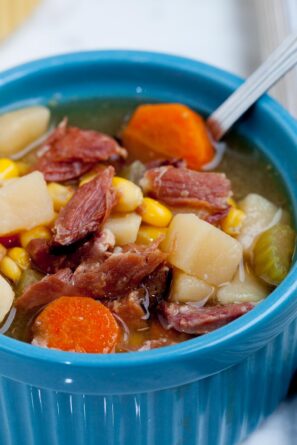 Ham Bone Soup with chopped ham, potatoes, and carrots in a bowl