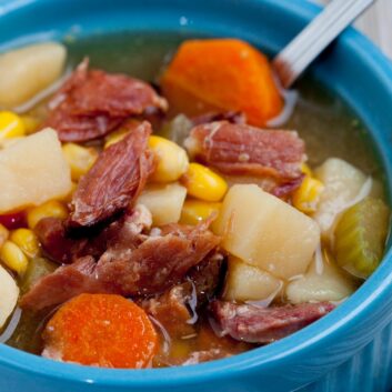Ham Bone Soup with chopped ham, potatoes, and carrots in a bowl