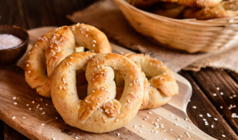 Soft homemade pretzels on a cutting board 