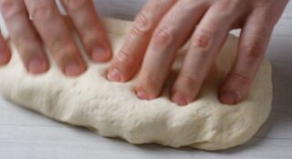 Kneading the dough by hand