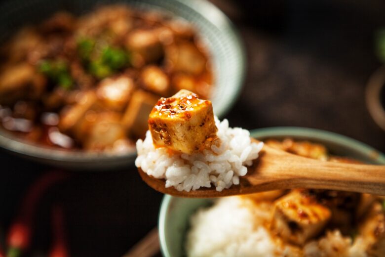 Cubed, stir-fried tofu served with white rice