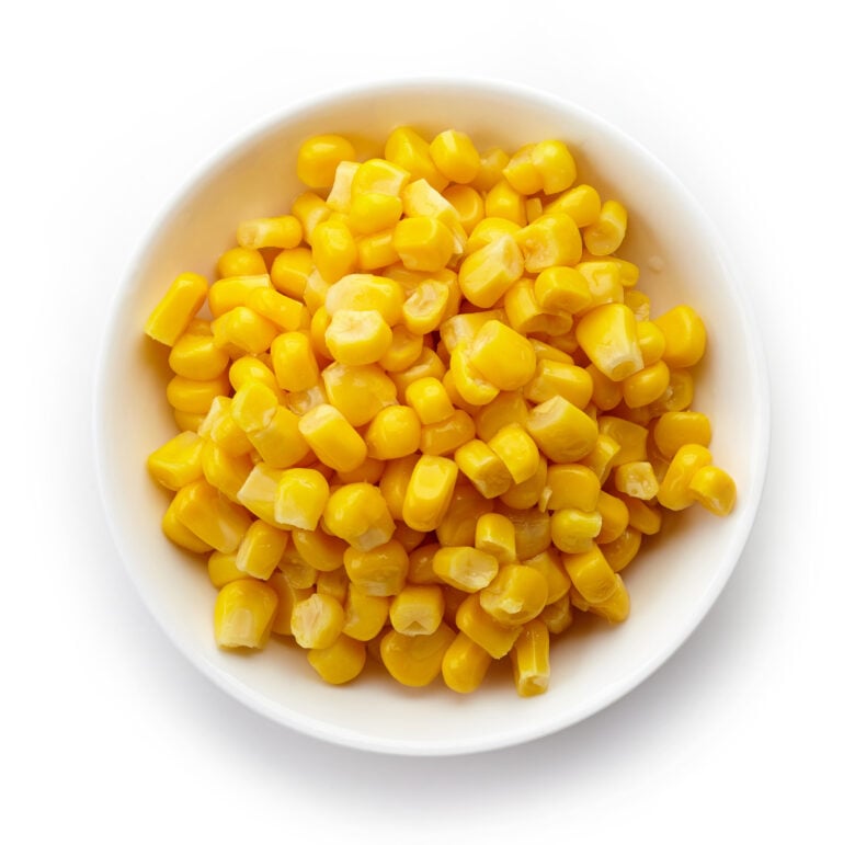 Corn kernels measured on a plate.