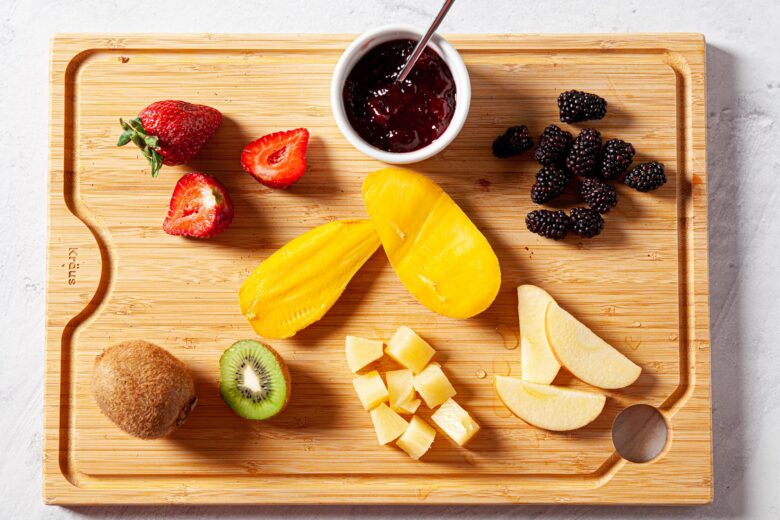 fruit salsa with mangos, kiwi, strawberries, pineapple, blueberries and apples