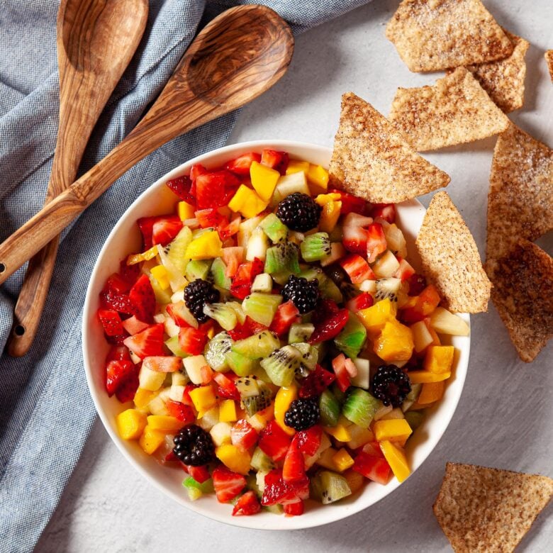 fruit salsa with mangos, kiwi, strawberries, pineapple, blueberries and apples