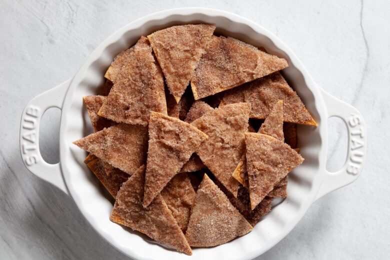 Baked cinnamon sugar tortilla chips sprinkled with cinnamon and sugar