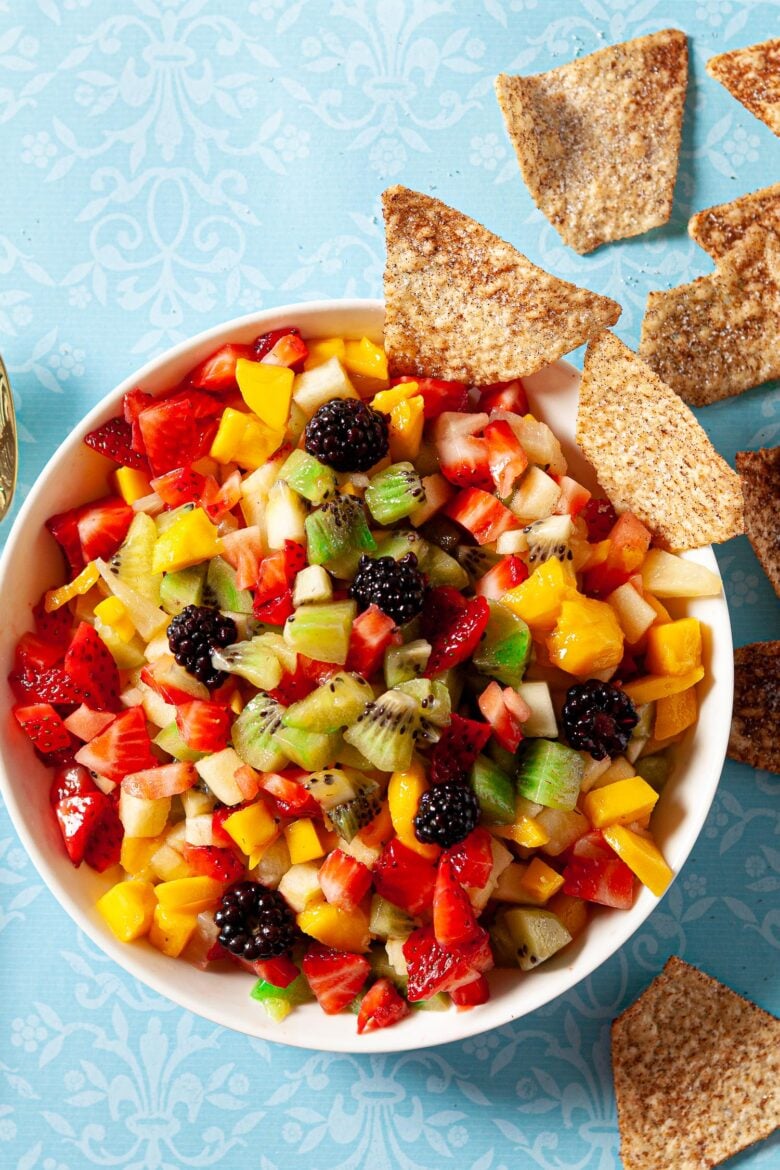 fruit salsa with mangos, kiwi, strawberries, pineapple, blueberries and apples