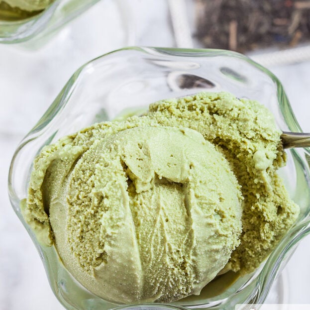 green tea ice cream in a glass cup