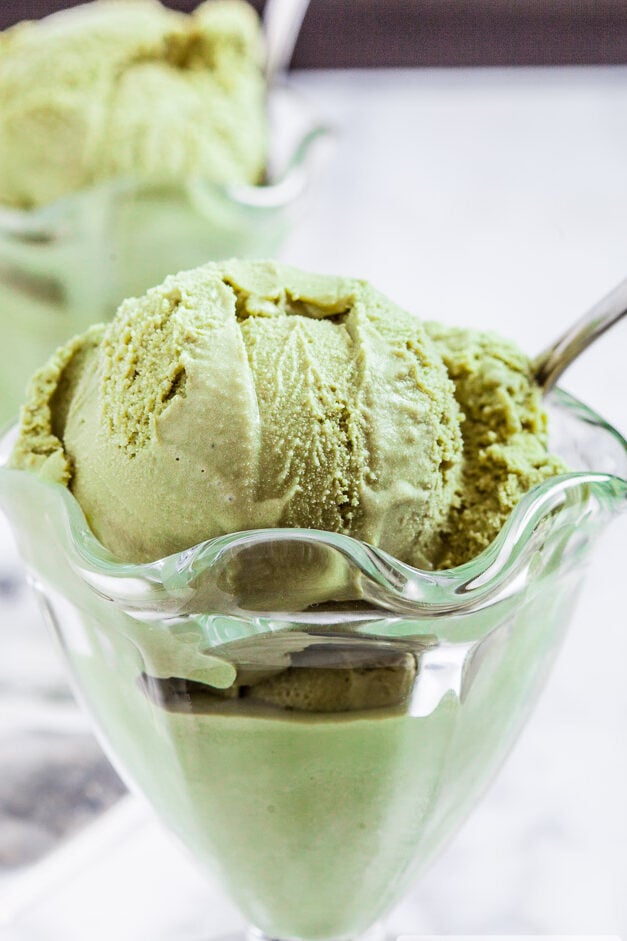 green tea ice cream in a glass cup