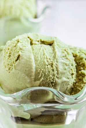 green tea ice cream in a glass cup