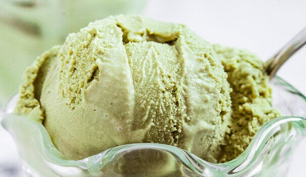 green tea ice cream in a glass cup