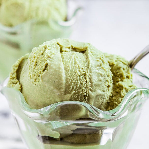 green tea ice cream in a glass cup