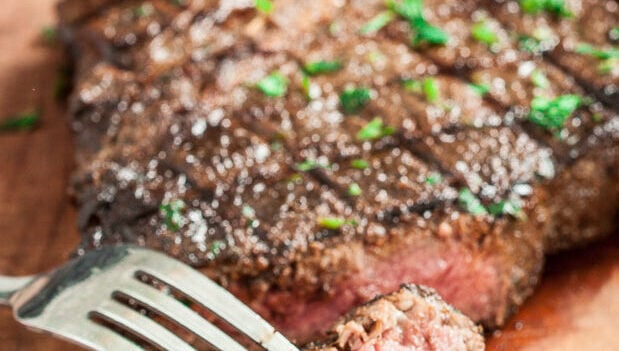 marinated ribeye steak cooked medium rare