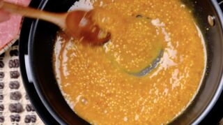 Pork chops honey mustard sauce in pan