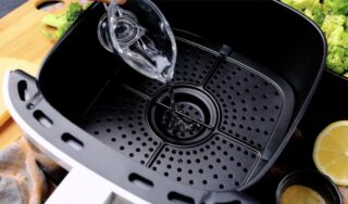 air fryer preparation with water on bottom