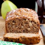 pear bread sliced on cutting board.