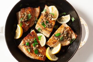 Barramundi in skillet