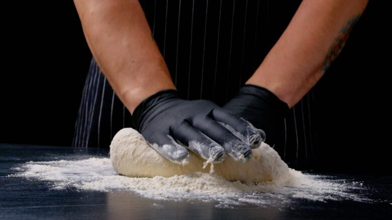 Bagel Dough Being Kneaded.