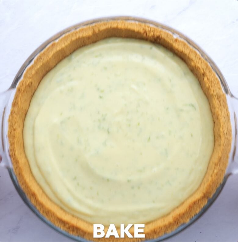 Key lime pie in graham cracker crust being baked