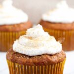 Pumpkin Cupcakes with whipped cream frosting.