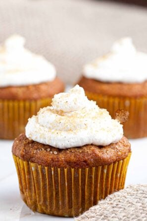 Pumpkin Cupcakes with whipped cream frosting.