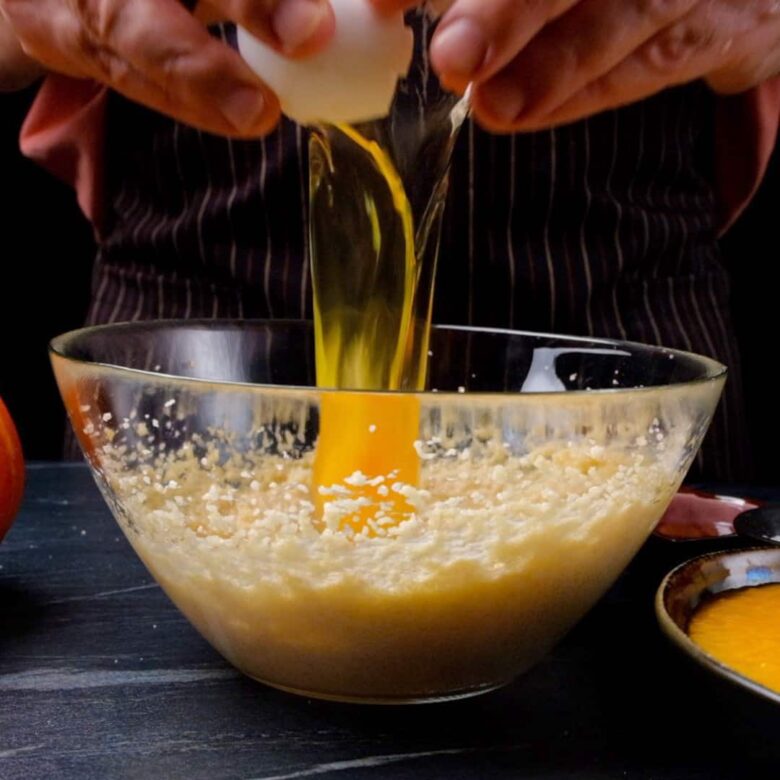 Pumpkin cupcakes wet ingredients in a bowl.