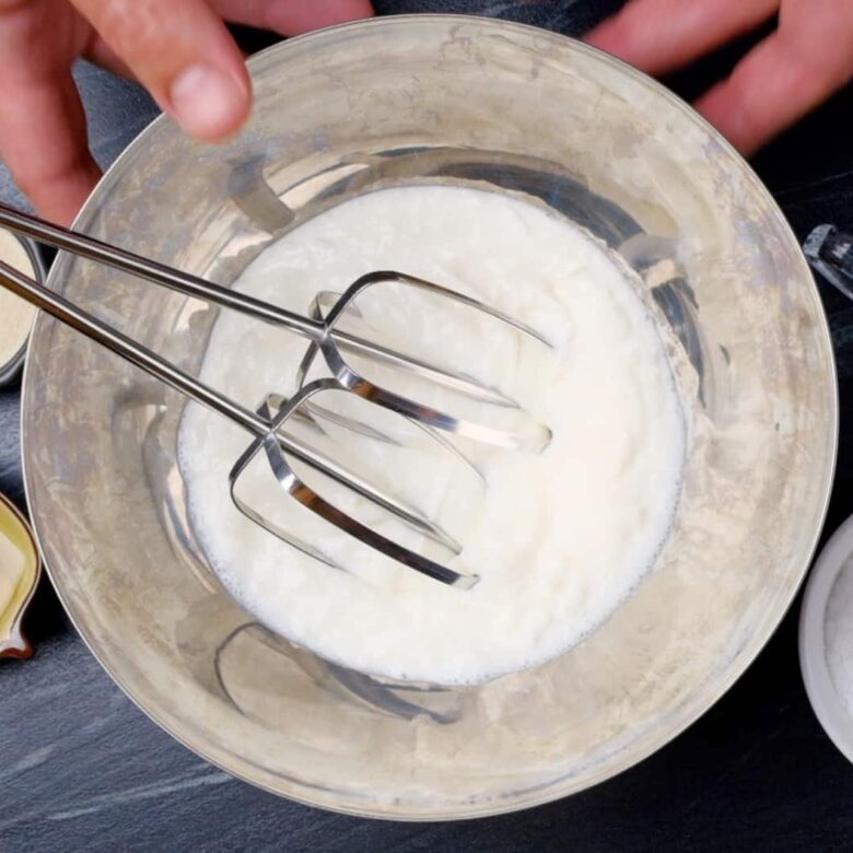 stabilized whipped cream heavy cream in a bowl.