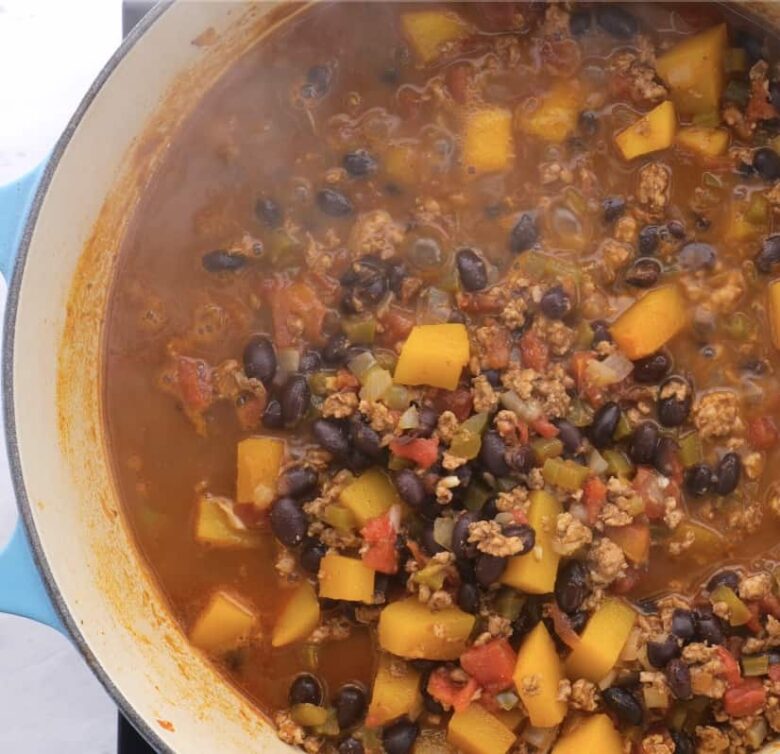 butternut squash chili cooking in pot.